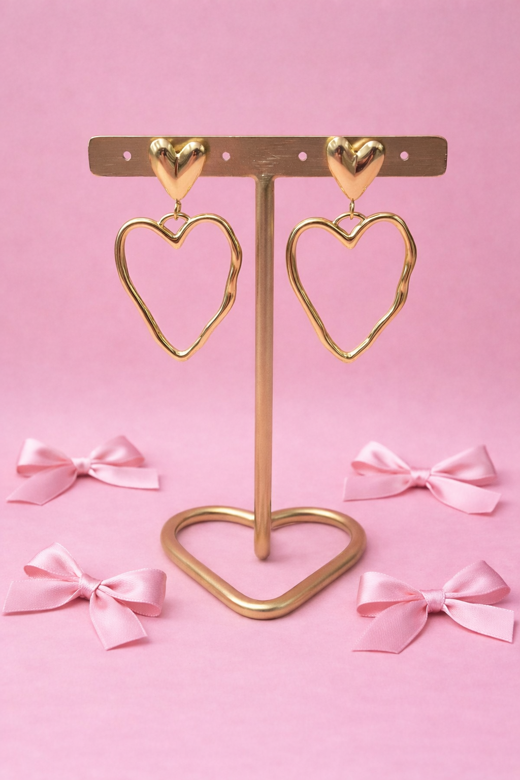 Oorbellen golden swirl heart - Goud